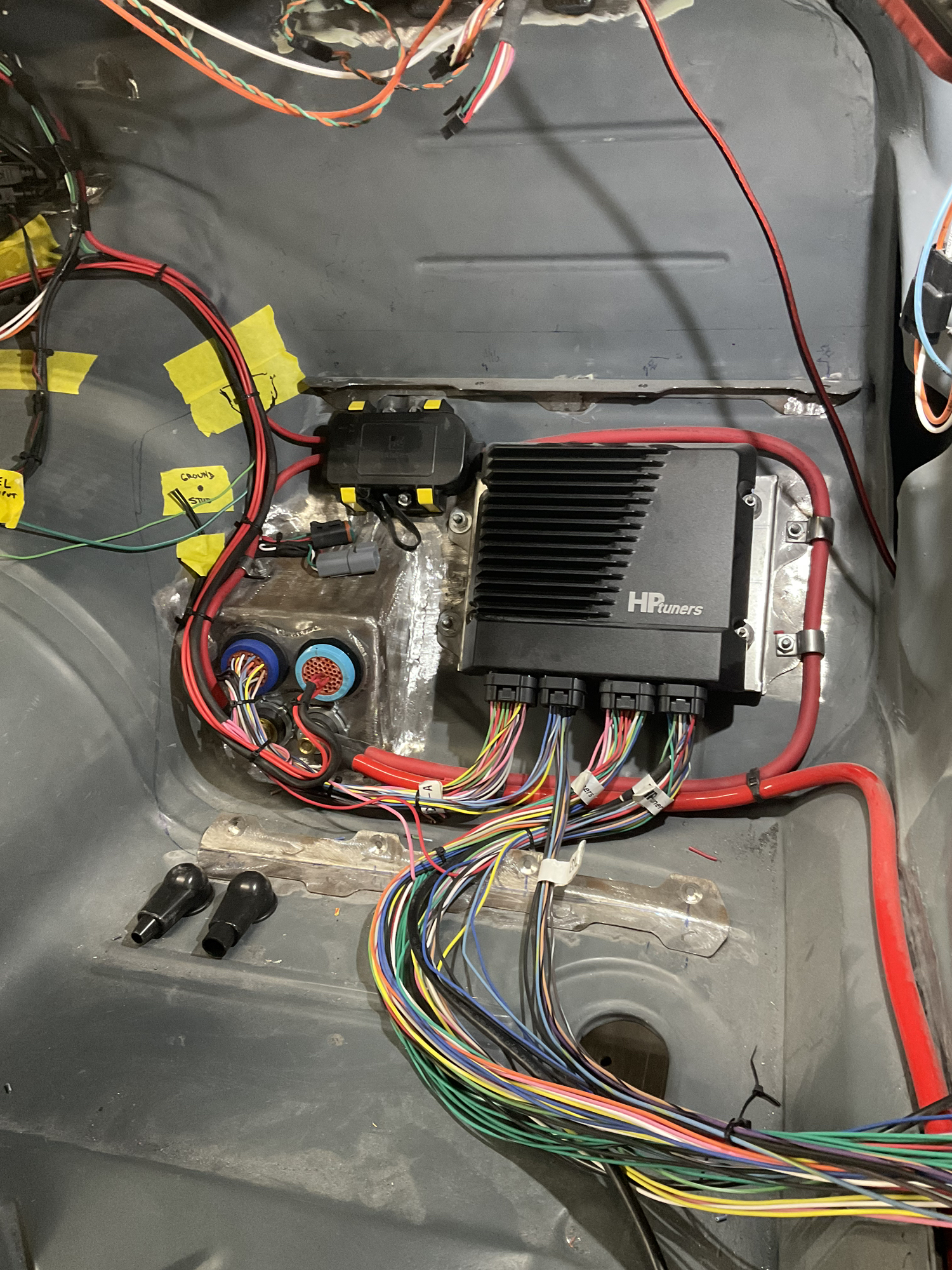 Custom wiring and electronic integration on a Pontiac Trans Am project at Squid's Rod Shop