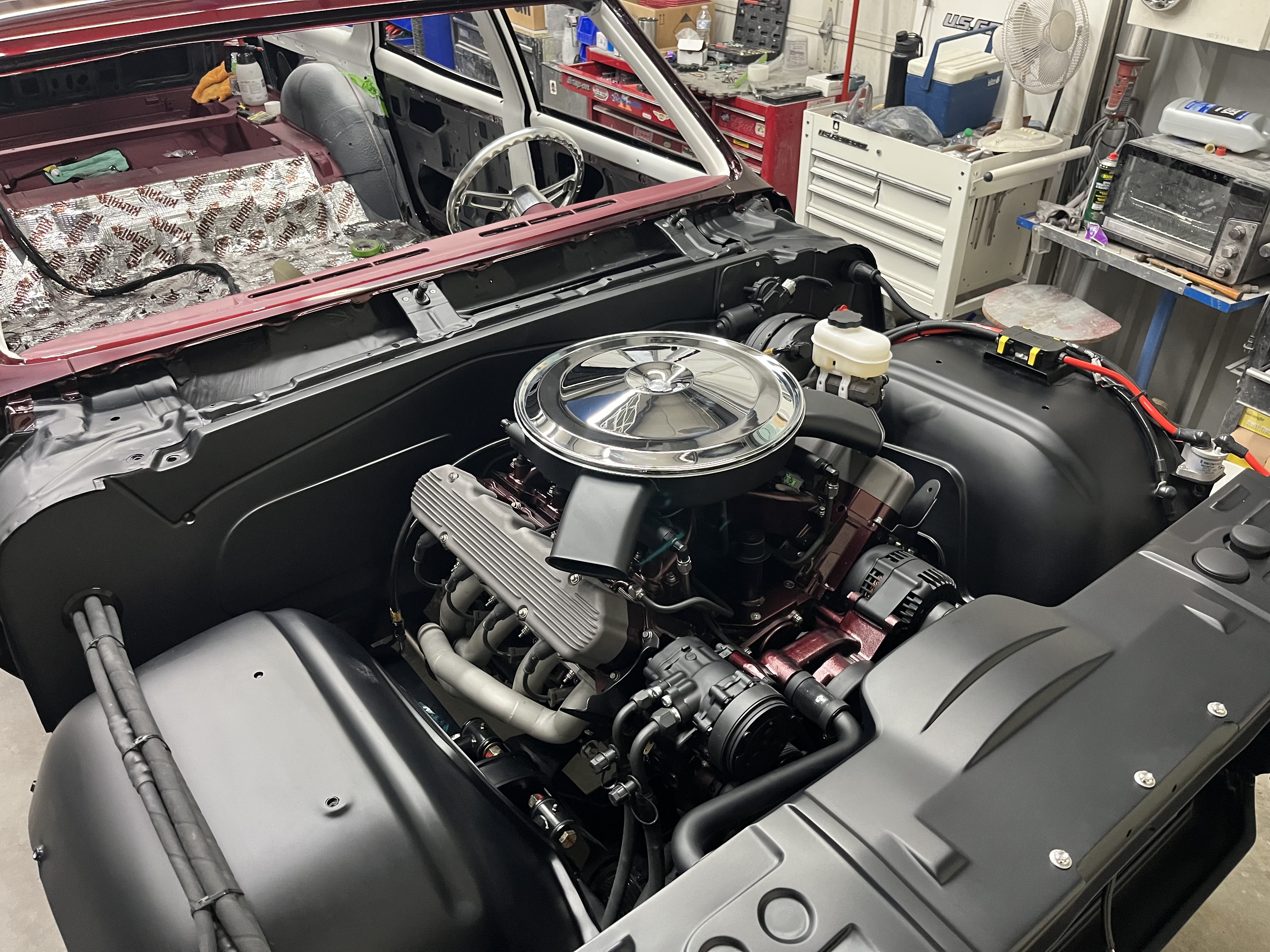 Custom engine and powertrain integration in the 1967 Oldsmobile Vista Cruiser at Squid's Rod Shop
