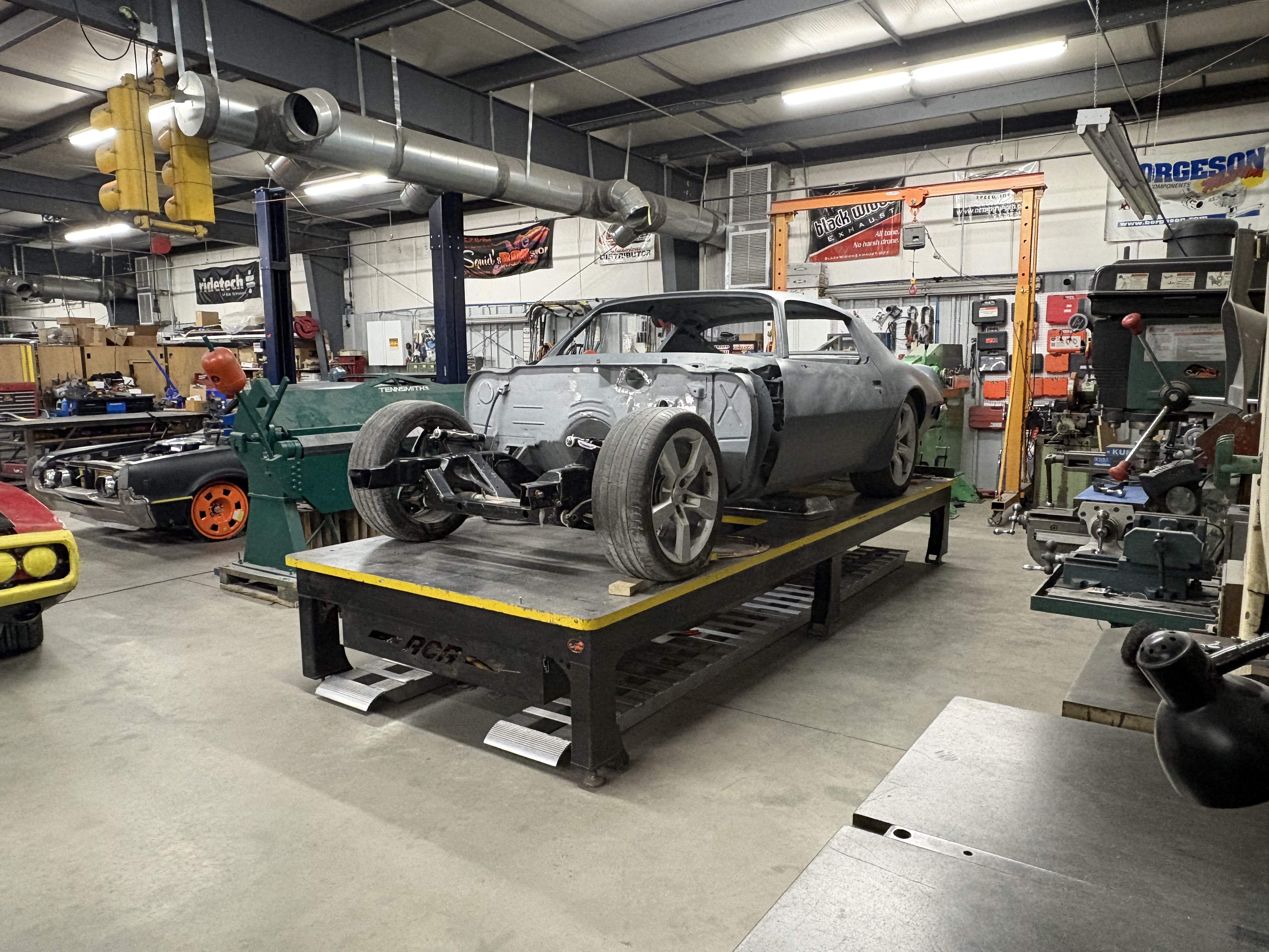 1971 Pontiac Trans Am on the frame table during custom fabrication work