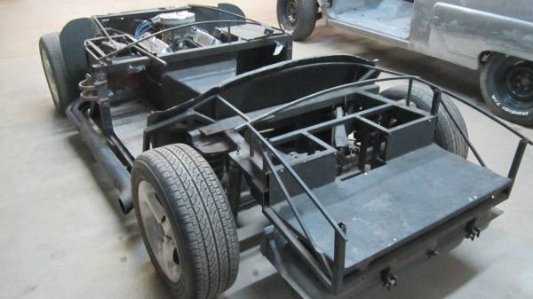 Chassis and components on arrival at the shop.