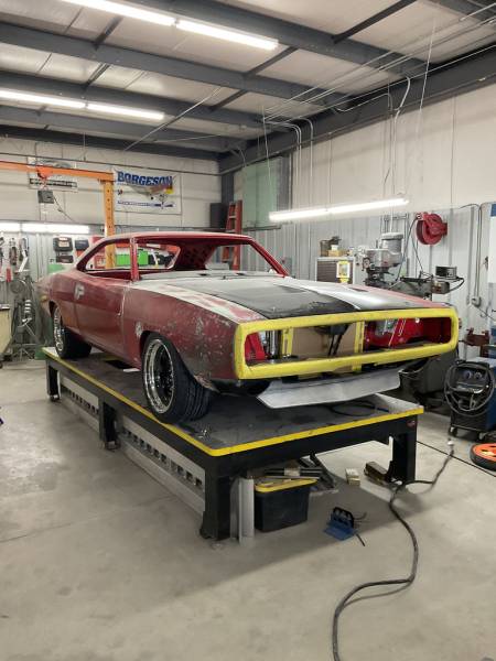 1970 Dodge Charger on the chassis platform during fabrication and bodywork at Squid's Rod Shop